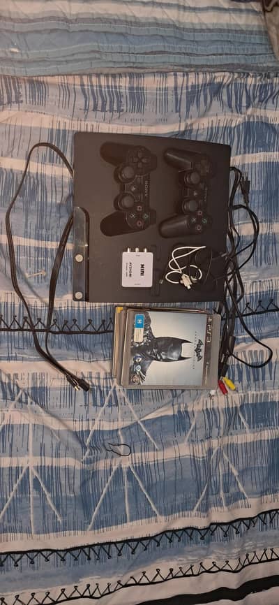 [NEGOTIABLE PRICE] Ps3 slim with 2 controllers and 7 games