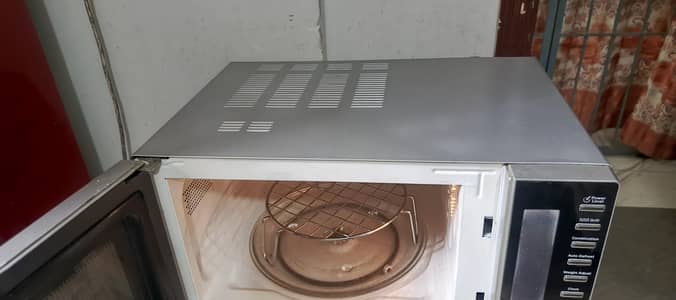 Dawlance 2 in 1 microwave + grill oven