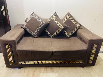 Brown 2 seater sofa with Greek key design 3 cousins