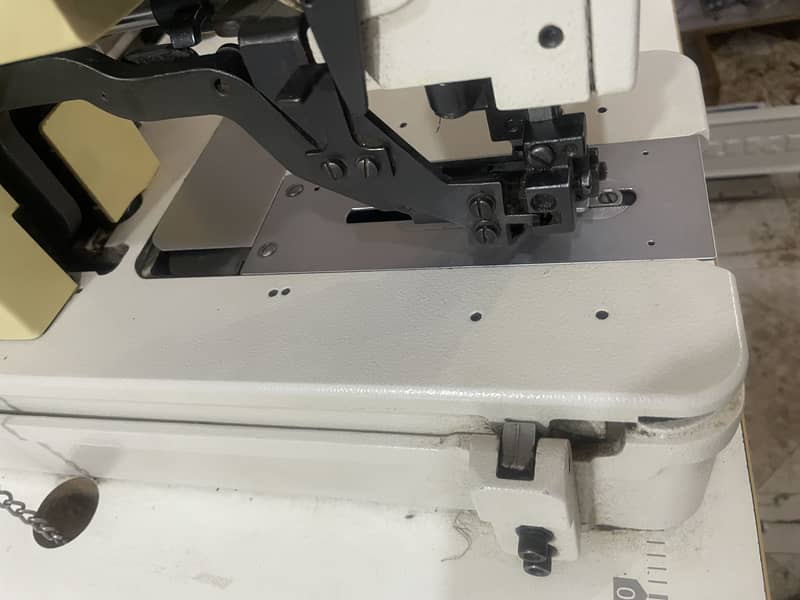 Jack button hole machine. Kaaj 2