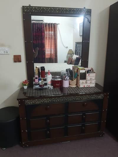 Bed along with two side tables and dressing
