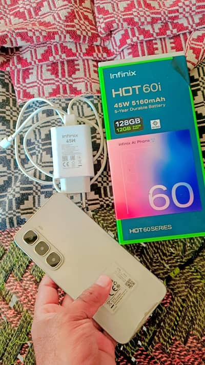Infinix Hot 60i  6+6  128GB Full Box 7.8 months wranty available