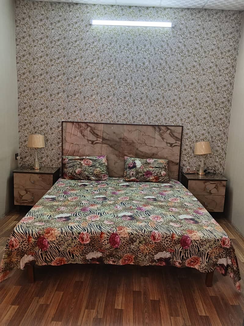 Bed with side table 0