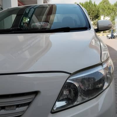 Toyota Corolla XLI 2011 converted gli total geniune