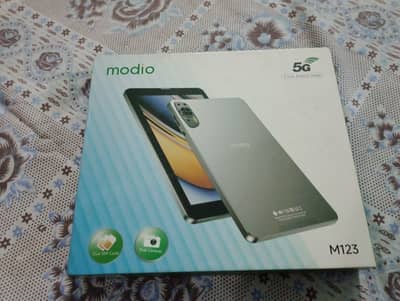 Modio M123 please buy me tablet please please Please please please Ple
