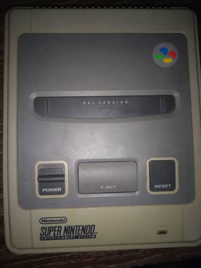 Super Nintendo entertainment system with 2 controller and 4 games