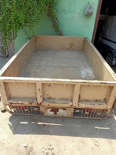سوزوکی پک اپ کی ٹرالی ہے سوزوکی پک اپ کا بیک ڈالا ہے دیسی بنا ھوا  ہے