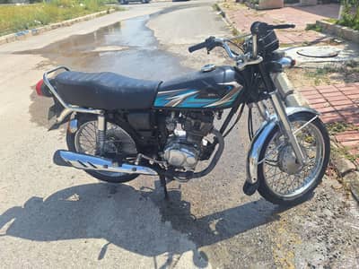 Honda CD 125 urgent sale ke liye hai Tanki tape bhi available hai