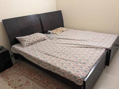 2x single beds and one side table