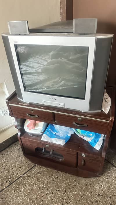 Sony vega TV with trolley for sale.