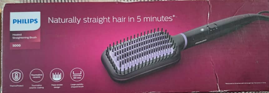 Phillips heated straightening brush 5000 series with 2 month warranty