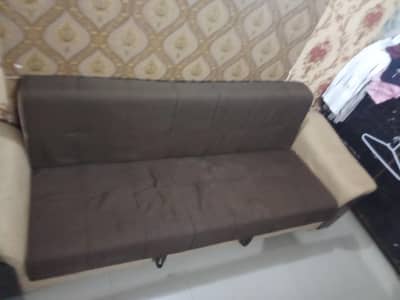 Brown and three seater sofa come bed with storage and convertable