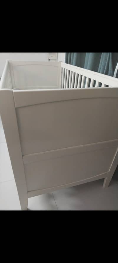 mother care baby cot white color