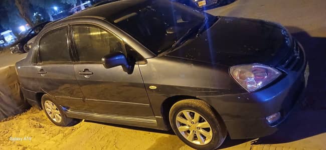 Suzuki Liana 2006 lxi spots had cash no rxi