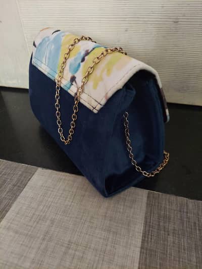 Stylish Blue Velvet Sling bag by Heels-Golden Chain Strap