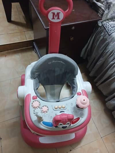 A branded Two in one Walker in pink with White Combination
