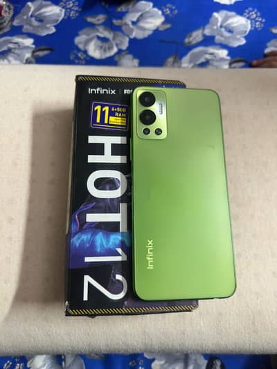 Infinix Hot 12 (6+5 RAM / 128GB ROM) – With Box, Budget Gaming Beast