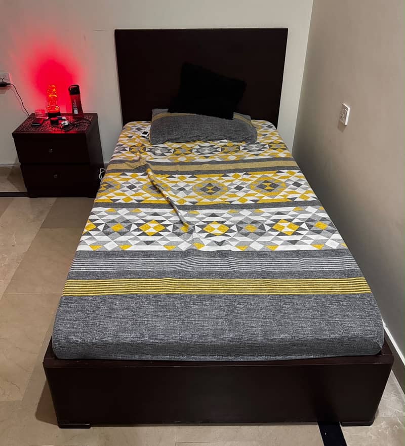 Single bed with side table 0
