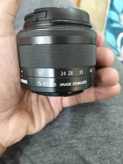 Canon EOS M100 with 14-45mm body kit lens