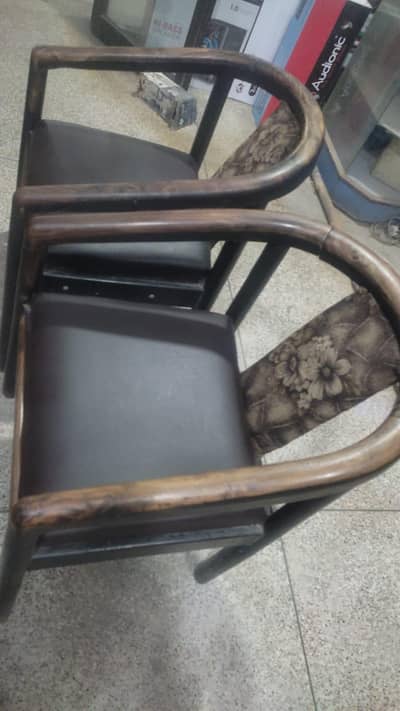 two chairs , one table