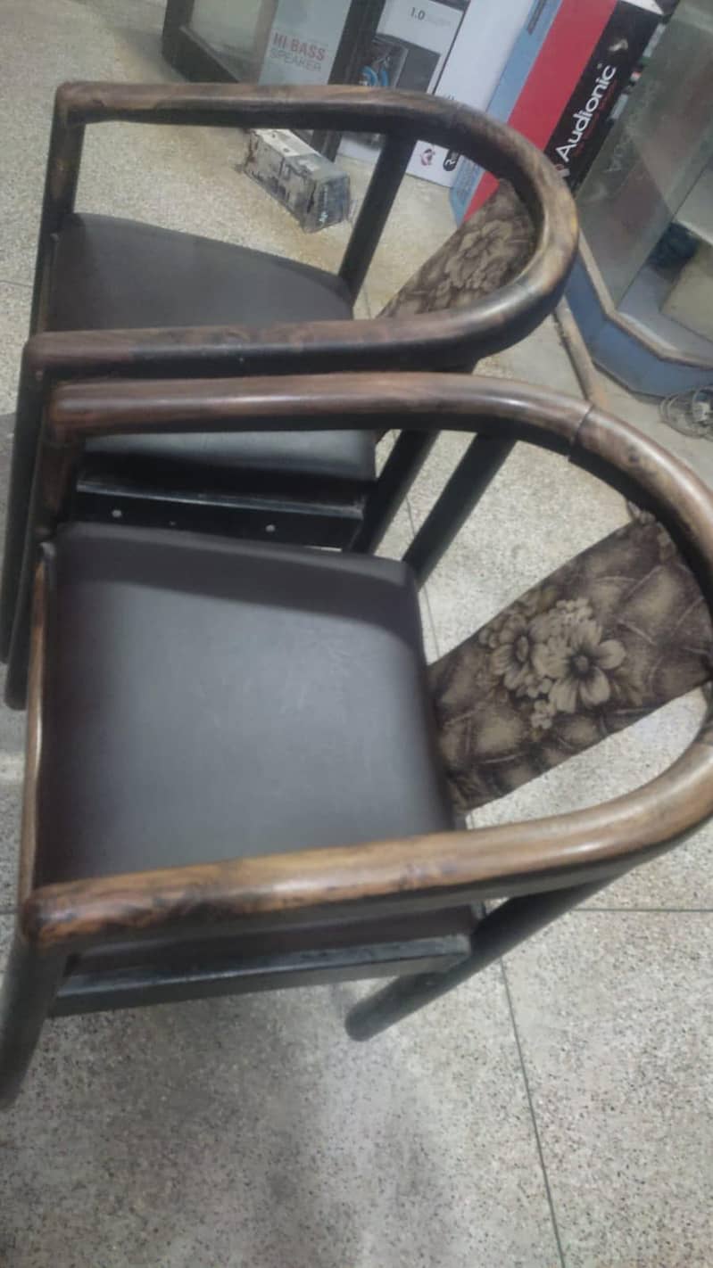 two chairs , one table 0