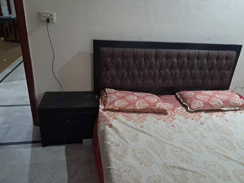 double bed with one side table 1