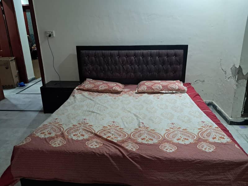 double bed with one side table 2