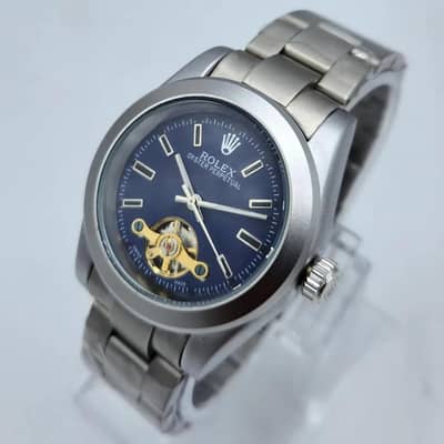 Stunning blue sunray Rolex watch with open heart window