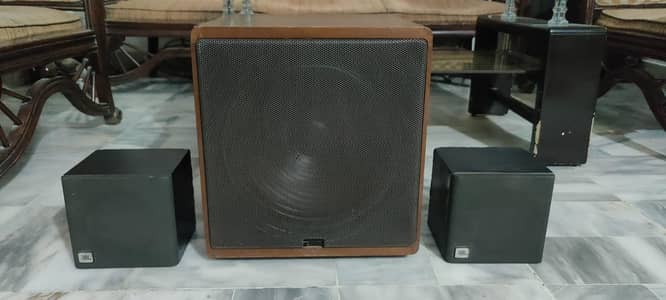 CANTON NETWORK SUBWOOFER WITH JBL SURROUND SPEAKERS.