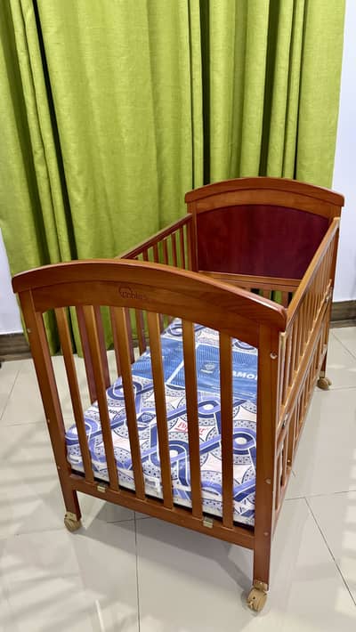 Tinnies Wooden Baby Cot for sale in excellent, like-new condition.