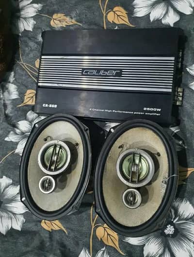 Kenwood Sound System with Caliber Amplifier