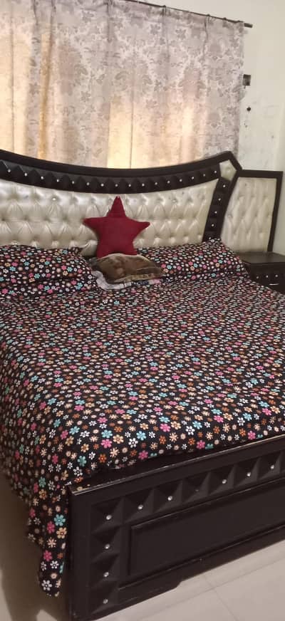 bed with mattress and side tables