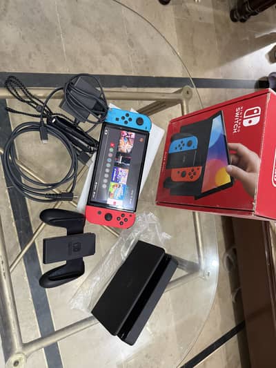 Nintendo switch OLED with complete accessories and box