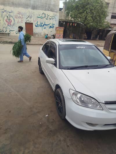 Honda civic 2005 model new tyre rims chilled AC smioth gear shifting