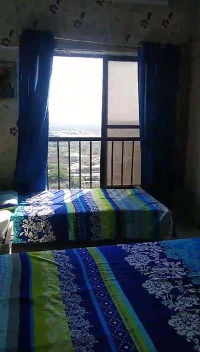 One room with share only for female with attached washroom, kitchen, wardrobe, sea facing, dishes available in Clifton block-2