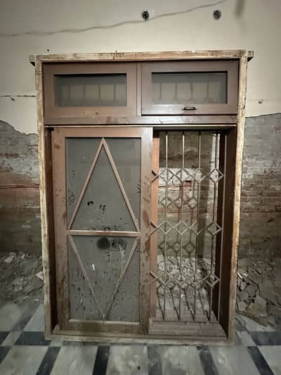 Pure Dyar wood window with Glass and security Grill