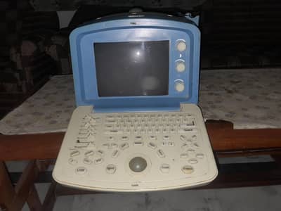 "Ultrasound Machine + Probe + Stabilizer + Stand _Rs. 130000".