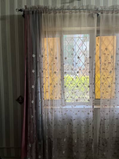 Beautiful double curtains 41*81 inches.