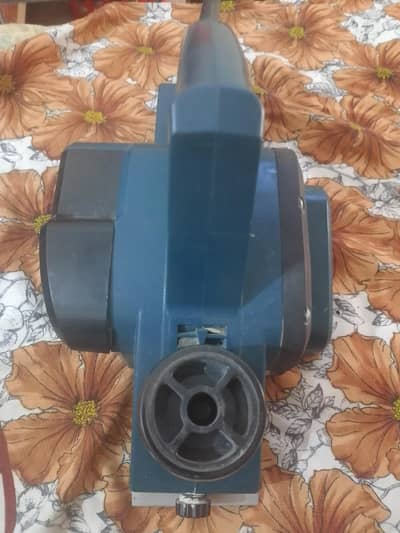 Wood Planer machine.