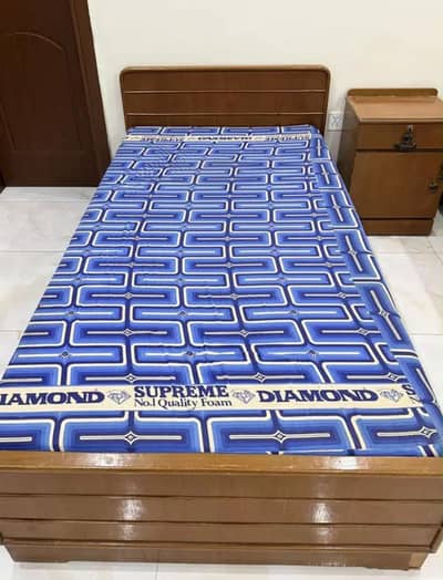 ~ Two Single beds with two mattresses and one side table. Urgent sale!