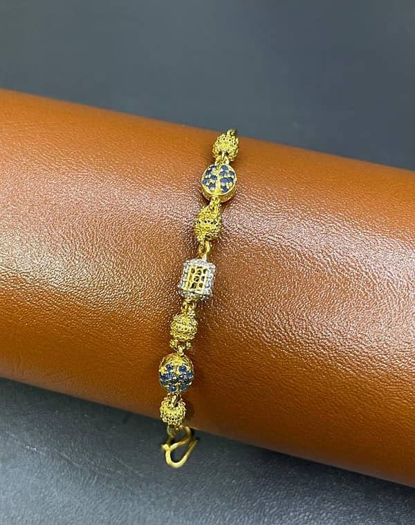 Silver Bracelet – Four Balls, Two Leaf Design with Blue & Zircon Stones and Center Cage Zircon Ball | Time N Treasure