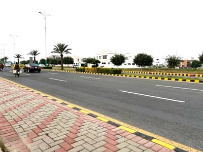 9 Marla Residential Plot Main Of Back For Sale In DHA Phase 4 Block KK Lahore.
