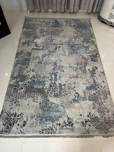 grey and white turkish rug with blue hints