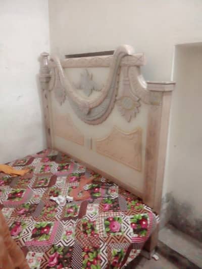 wooden double bed