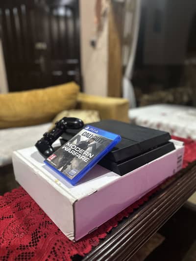 PLAYSTATION 4 with Controller and 1 game (500 gb version)