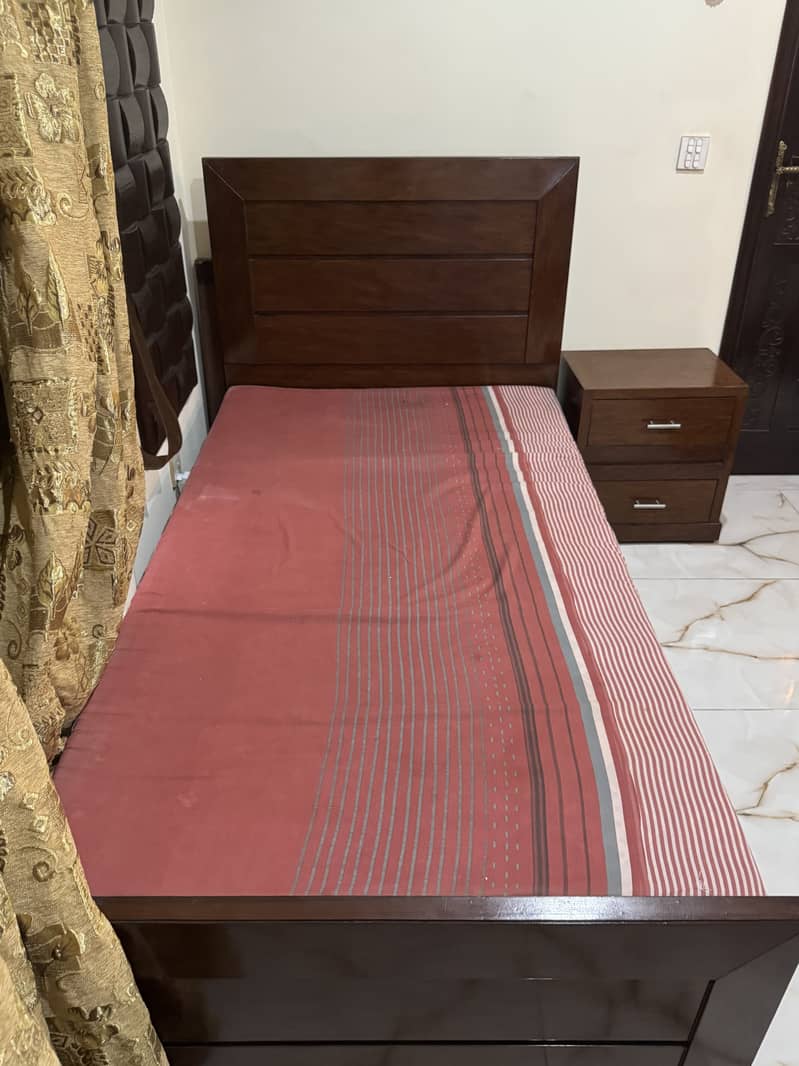 Single bed with side table 0