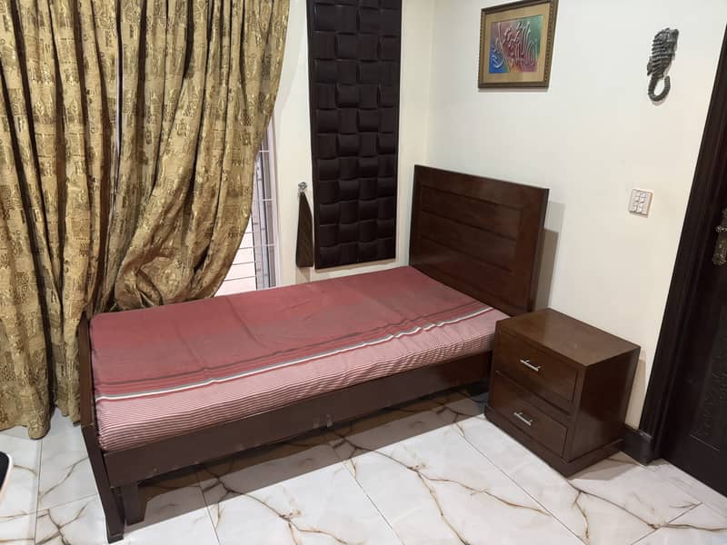 Single bed with side table 4