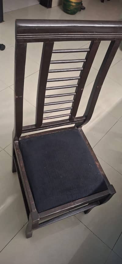 Glass top wooden dinning table with 6 chairs