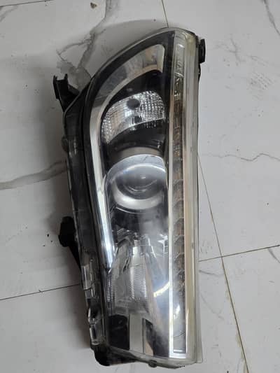 Revo Headlight Original