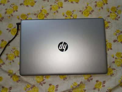 This stylish HP laptop features a premium silver finish with